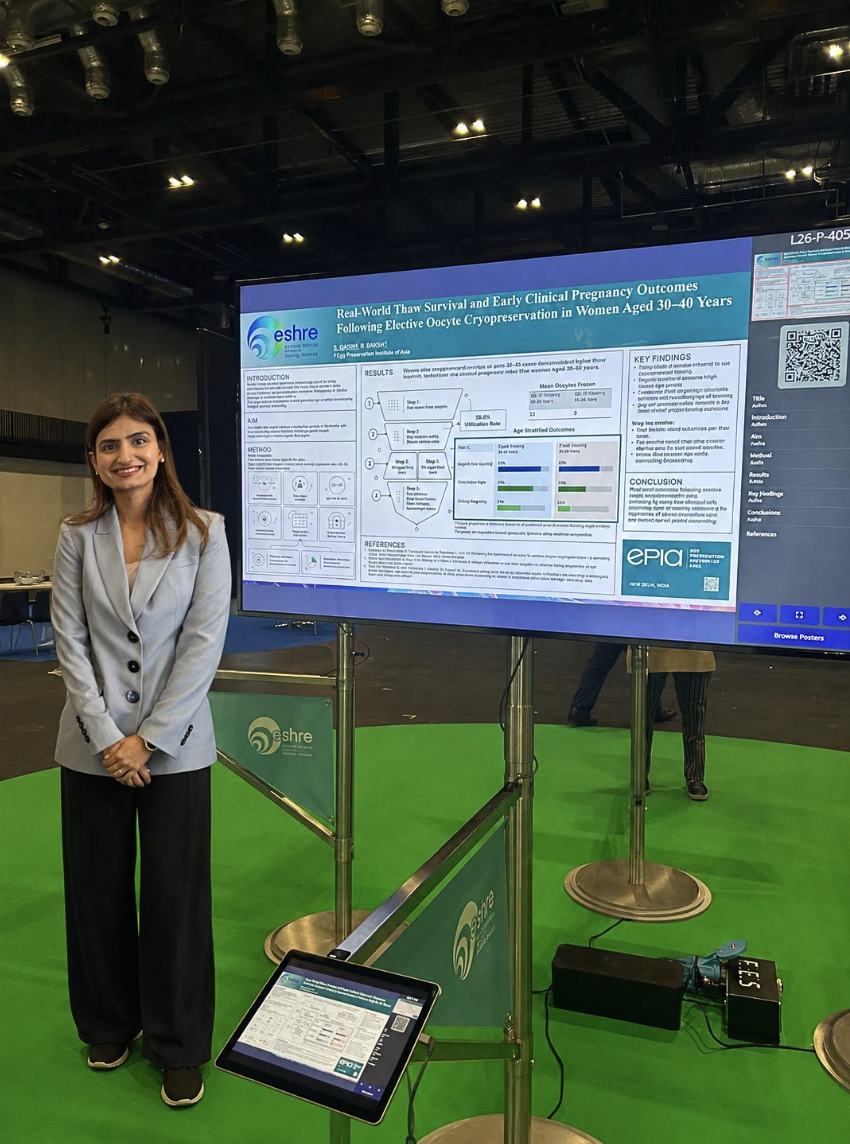 EPIA researcher beside the egg-freezing outcomes presentation at ESHRE